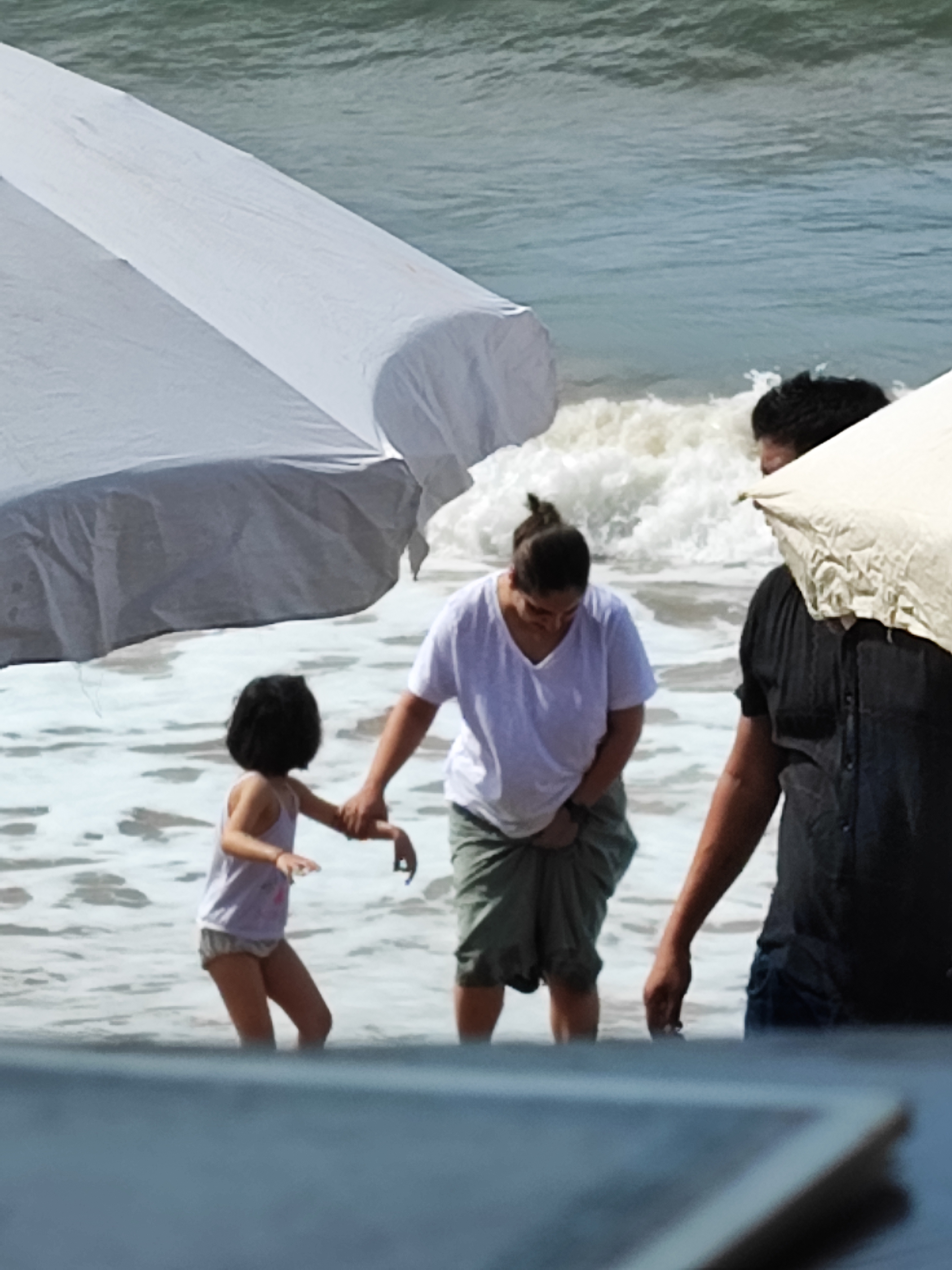 My daughter and I splashing in the Goan sea.